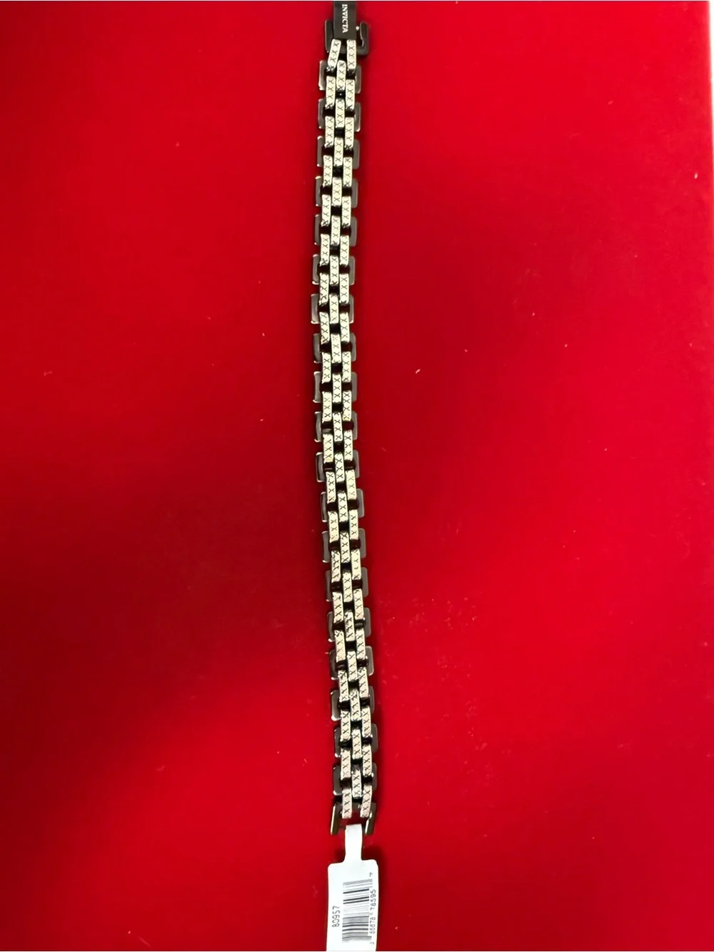 Invicta branded bracelet Diamond-cut finish for added sparkle Stainless stee